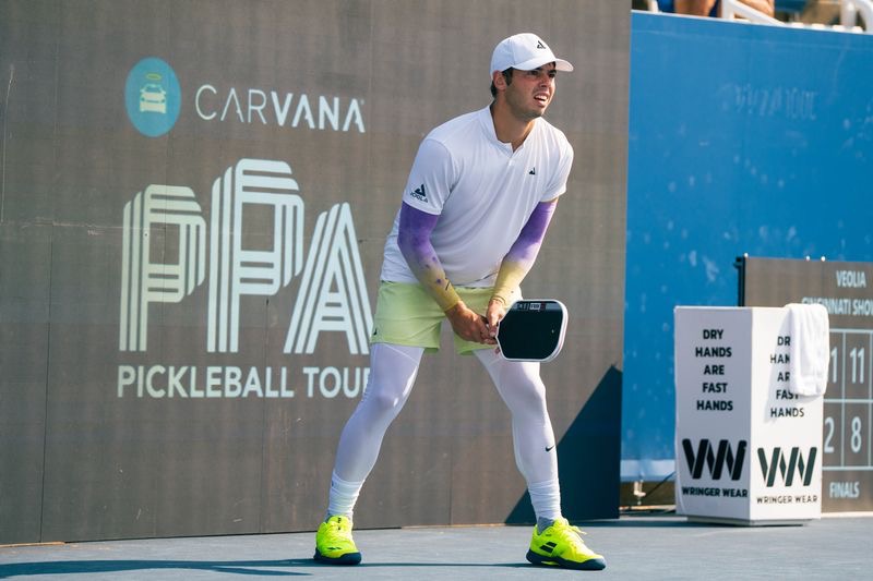 Ben Johns wearing leggings and a pair of shorts 